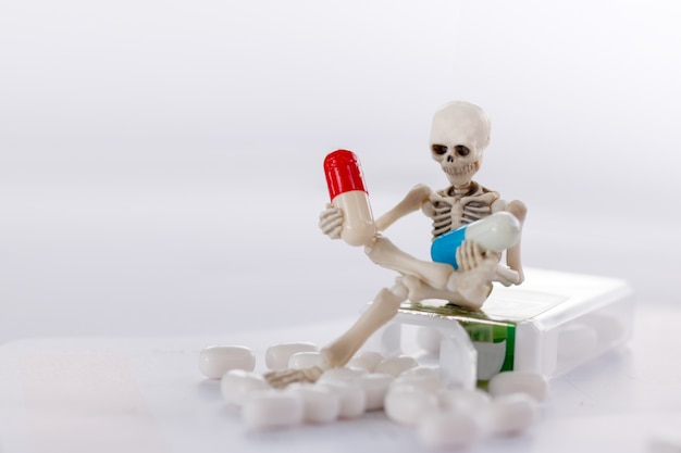 Skeleton and drug, medical health and against drugs concept.