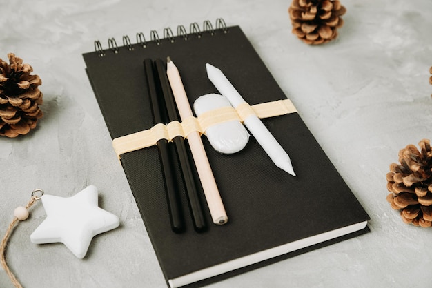 Sketchbook or notebook pencil and eraser set Christmas gift concept