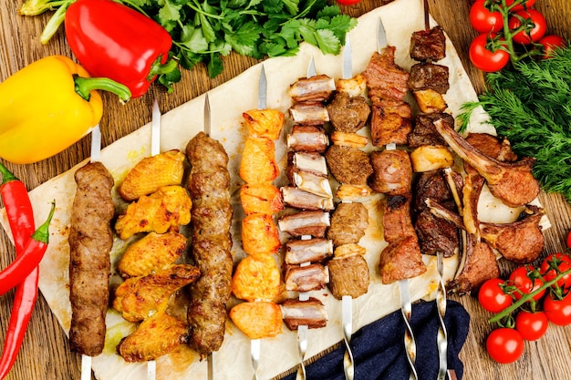 Skewers with different kinds of meat and dough