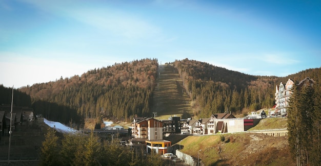 Ski resort in Carpathian mountains in sunny day in autumn