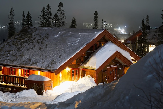 Ski resort at night sweden ski resort are at night wooden cottages in mountains with stars on sky