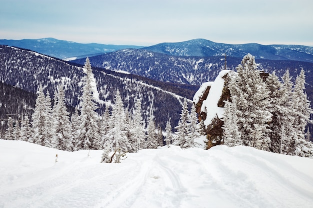 Ski slope in Sheregesh ski resort, Siberia, Russia. Mountain landscape.