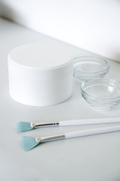 Skin care products at beauty salon mockup Plastic jar with face cream