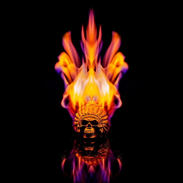 A skull ablaze consumed by multicolored flames against a backdrop of darkness