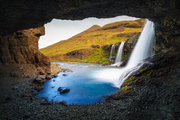 Skutafoss waterfalls near hofn in iceland photographed from a cave