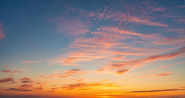 The sky before dawn orange clouds on the background of the blue sky