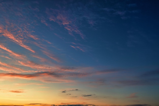 The sky before dawn orange clouds on the background of the blue sky