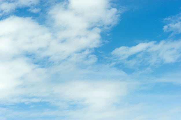 The sky and the blue clouds on a bright blue day 