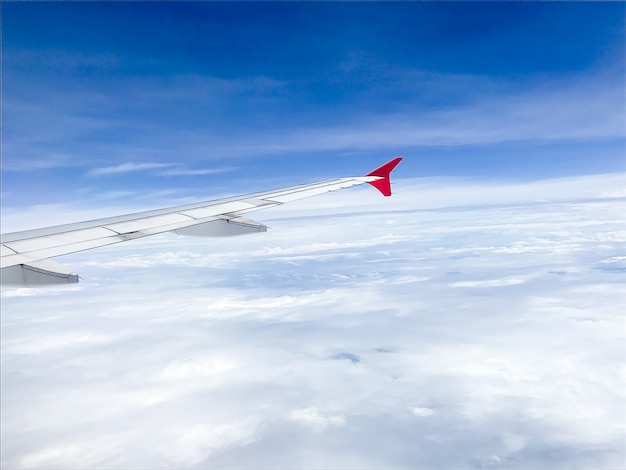 sky and cloud with airplane wing