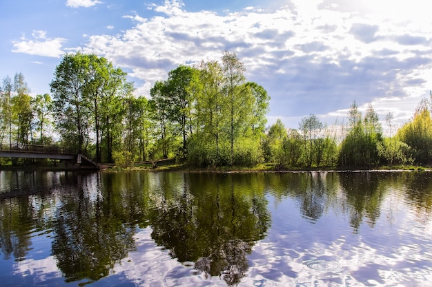 The sky and clouds are reflected in the water