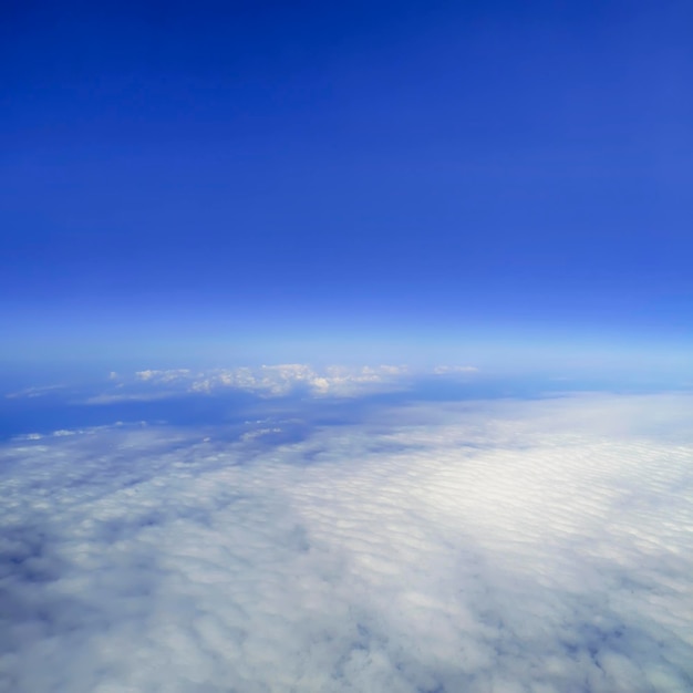 Sky Above the Clouds, Cloudscape background, Blue Sky and Fluffy Clouds