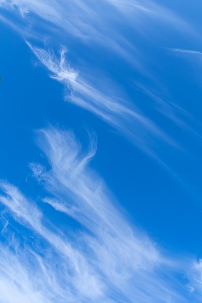 The sky is blue with clouds in beautiful strangely patterned lines