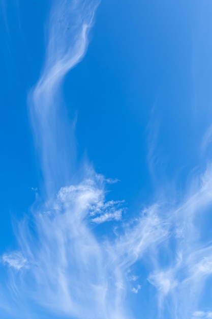 The sky is blue with clouds in beautiful strangely patterned lines