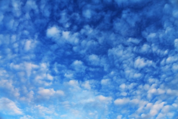 The sky is covered with a soft warm blanket of clouds Background wallpaper for designers