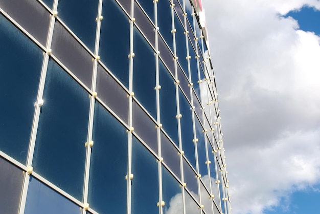 Sky reflected in office building