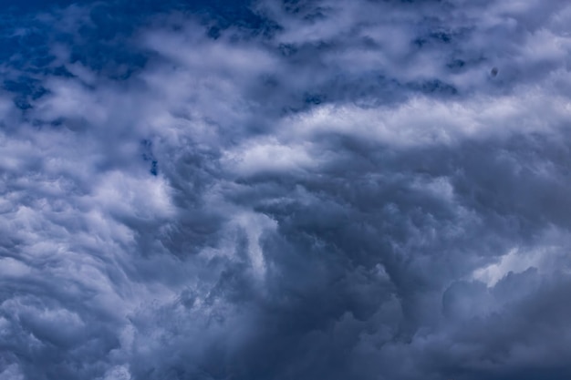 a sky with clouds that has the word b on it