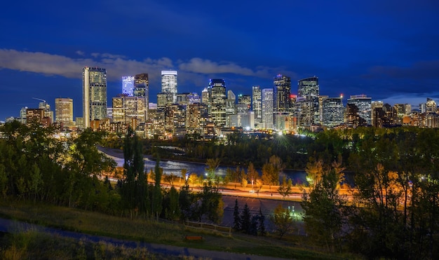 Skyline of Calgary with Bow River in Canada at night