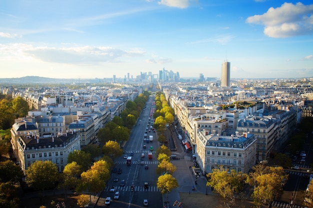 Skyline of Paris city place de lEtoile towards La Defense district, France, retro toned