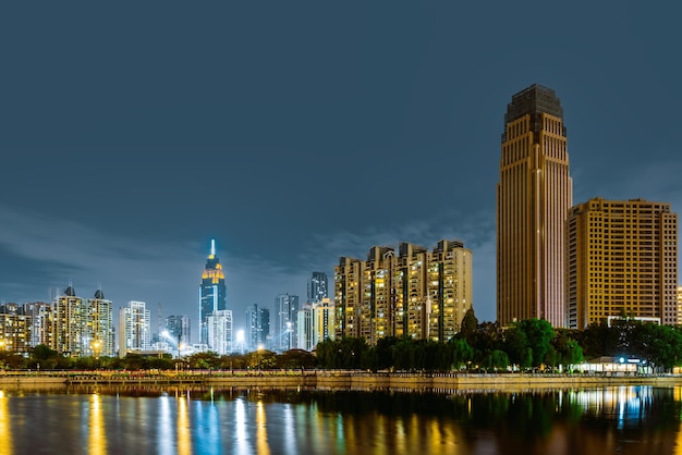 Skyscrapers by the lake night view of Wuhan China