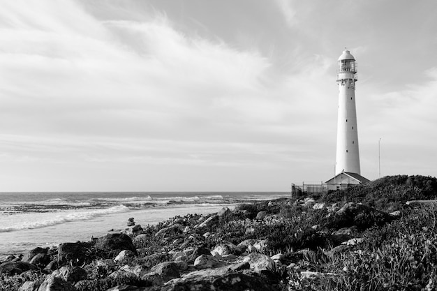 Slangkop Lighthouse near the town of Kommetjie in Cape Town, South Africa at Sunset