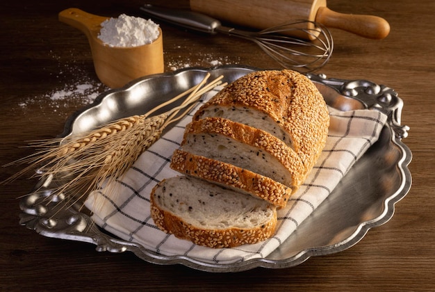 Slice of bread fresh homemade sourdough bread with black sesame seeds