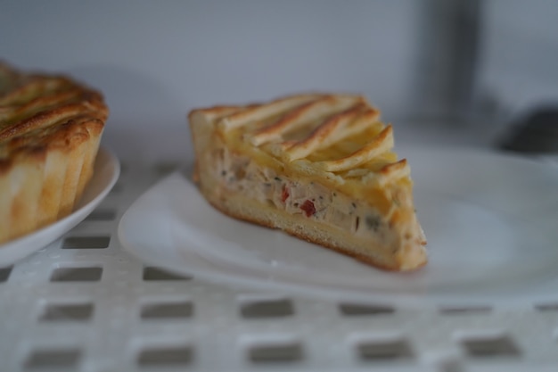 slice of a delicious baked pie on the white plate