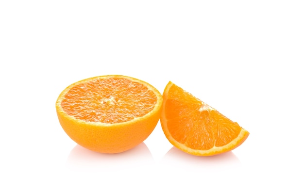 Slice of fresh orange on white wall