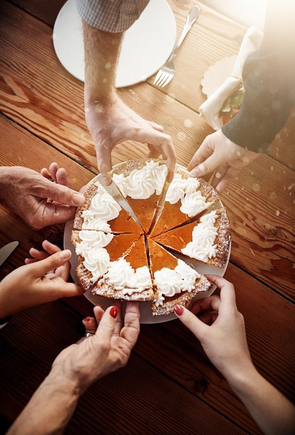 Photo slice hands and pumpkin pie for event snack and thanksgiving with celebration people and dessert closeup catering and group with food wooden table or family with social gathering and sweet meal