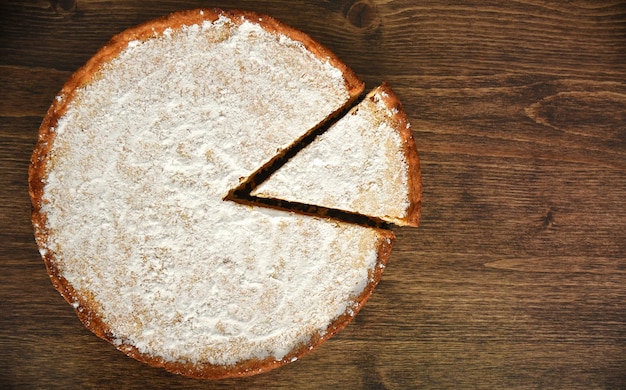 Slice of homemade pie with lemon and orange filling