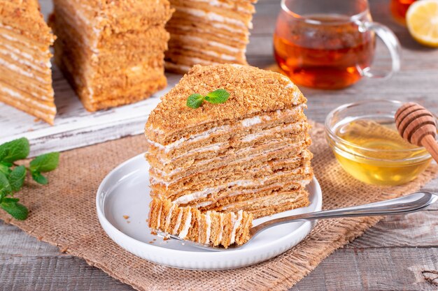 Slice of honey cake, selective focus