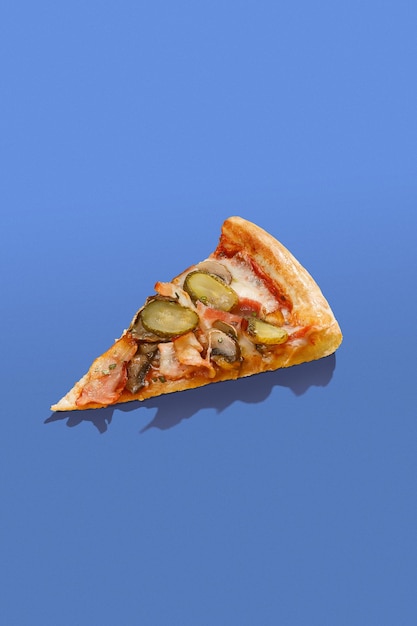 Slice of pizza over bright color background