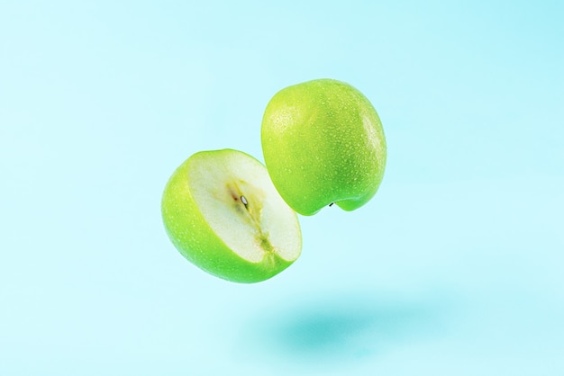 Sliced apple with levitation effect minimal concept