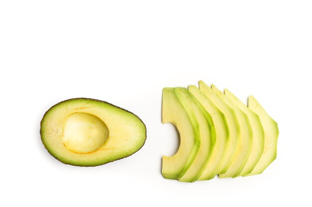 Sliced avocado on a white background