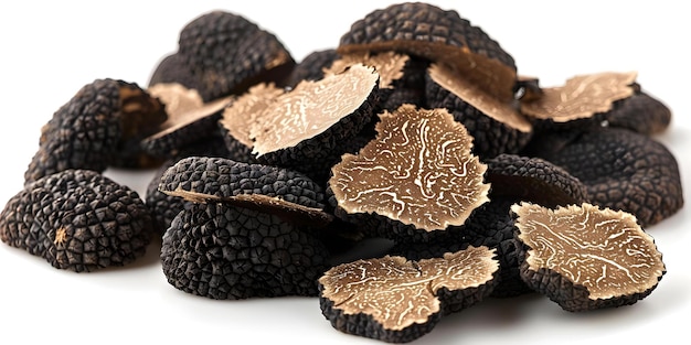 Sliced black truffles isolated on a white background with clipping path Concept Truffles Food Photography Gourmet Ingredients Culinary Art Isolated Objects