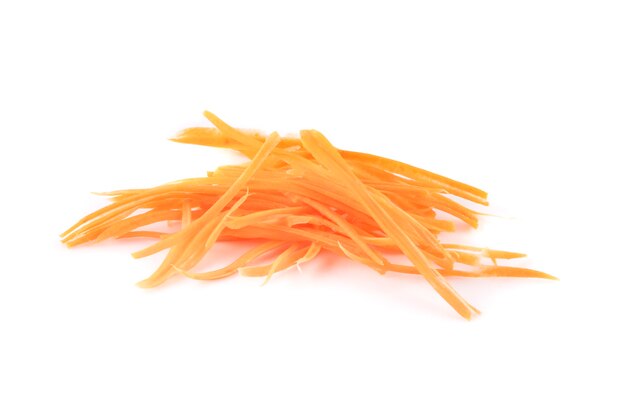 Sliced carrot isolated on white surface.