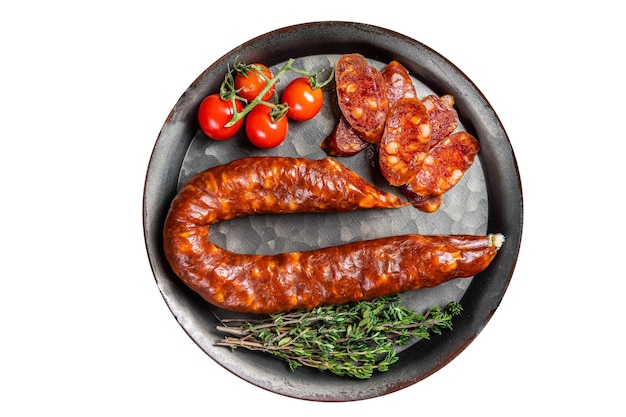 Sliced Chorizo sausage slices of dry cured pork with herbs and spices Isolated on white background