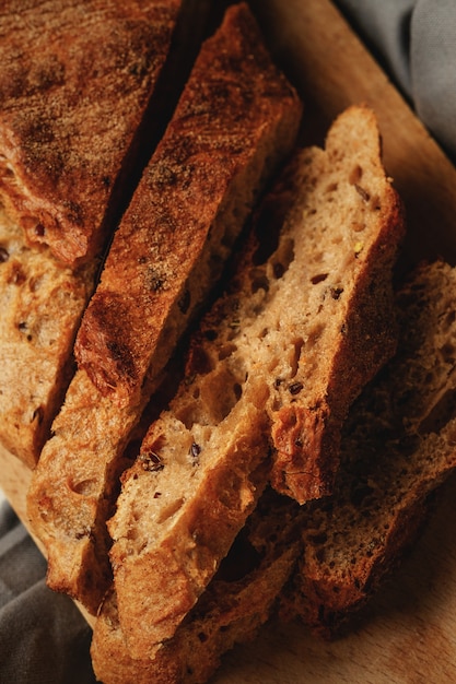 Sliced french baguette bread made with buckwheat flour and seeds