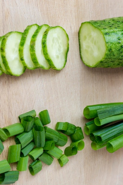 Sliced green vegetables on a cutting board Top view