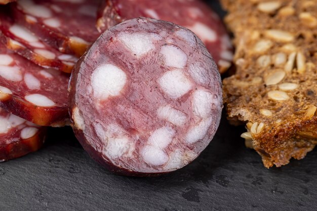 sliced highquality pork sausage with the addition of lard pieces readymade food products with the use of pork meat