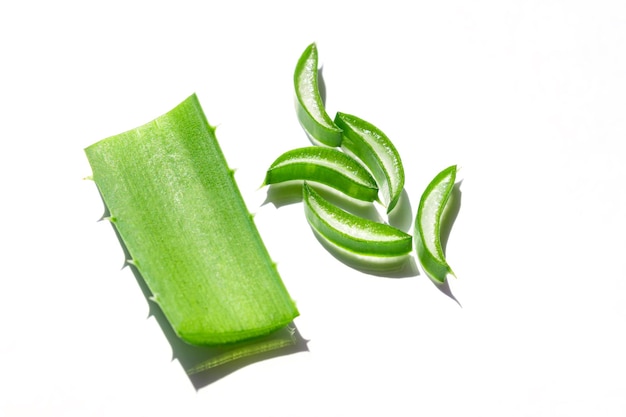 Sliced leaf of aloe vera on white background Natural organic ingredient for cosmetics Aloe gel