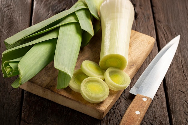 Sliced leek on wooden table