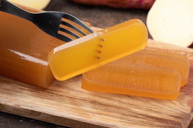 Sliced marrom glace on cutting board Selective focus