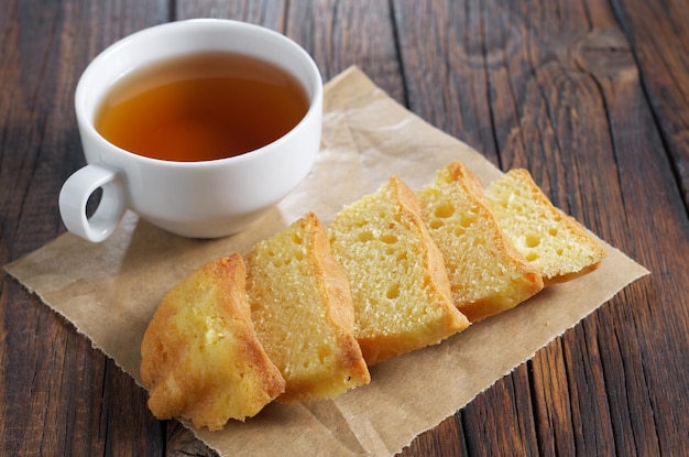 Sliced muffin and tea