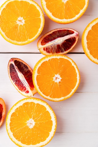 Sliced oranges on a light background Flat lay top view