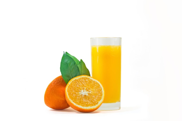 Sliced oranges with a glass of orange juice on a white background