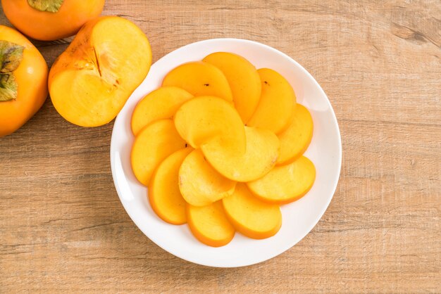 sliced persimmon on plate