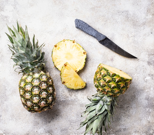  Sliced pineapple on white table