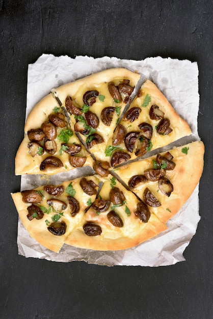 Sliced pizza with mushrooms and cheese