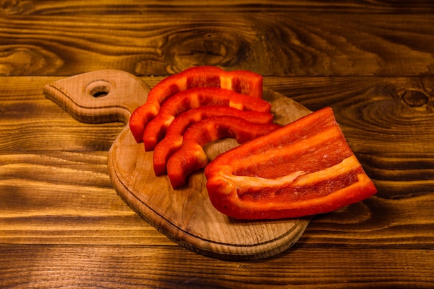 Sliced raw bulgarian pepper on cutting board