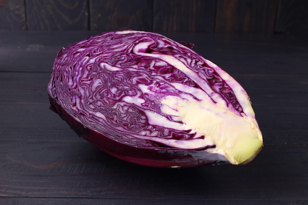 Sliced red cabbage on a dark background